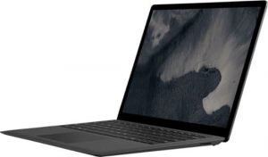 Microsoft Surface laptop with a dark background on the screen