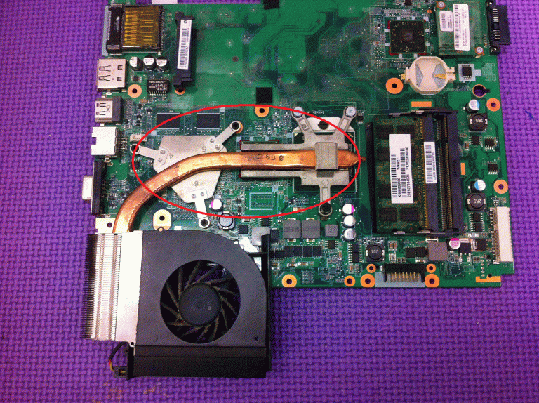 motherboard with a highlighted heat pipe and the laptop cooler